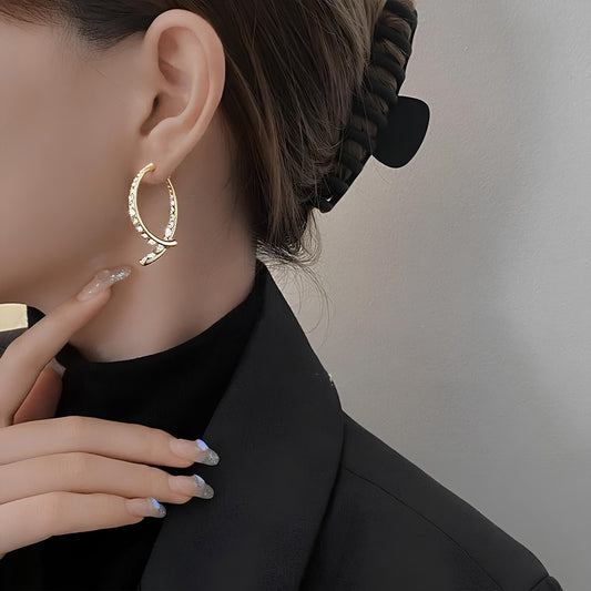 أقراط على شكل صليب منحني